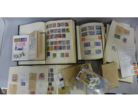 A collection of stamps; an album with 86 penny reds, Canadian stamps, commemoratives and First Day Covers 