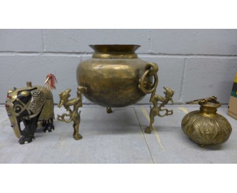 An Eastern brass censor, an embellished model of an elephant and an Eastern brass vessel 