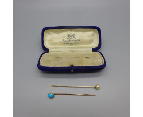 Two yellow metal stick pins, one turquoise, one pearl 