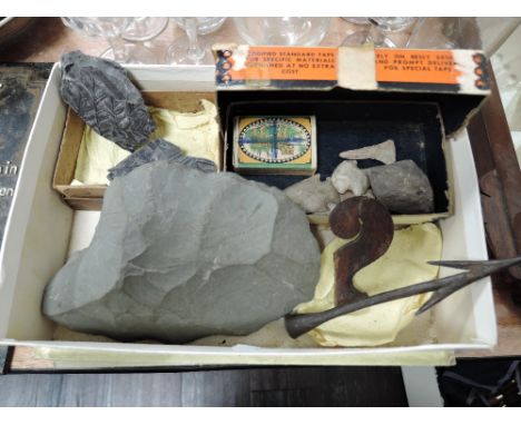 A selection of Native American indian stone tools including arrow heads and knapped stone knife