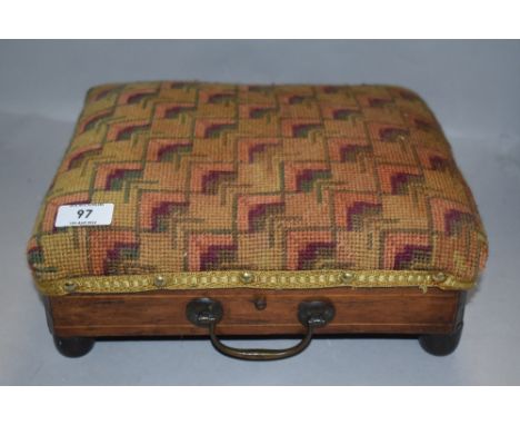 A small early 20th century inlaid mahogany foot stool, the padded tapestry seat with repeating design.