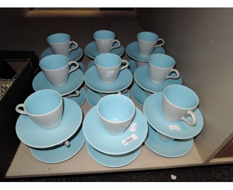 A set of eighteen vintage tea cup and saucer sets by Poole in a two tone blue and grey design