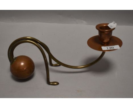An unusual copper and brass candlestick, the weighted spherical base issuing two brass supports and central shaped branch sup