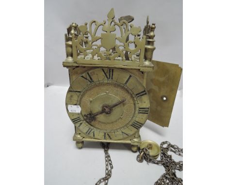 A part 17th century brass, steel and iron 'hook and spike' lantern clock , with finial topped strapped-crown enclosing the be