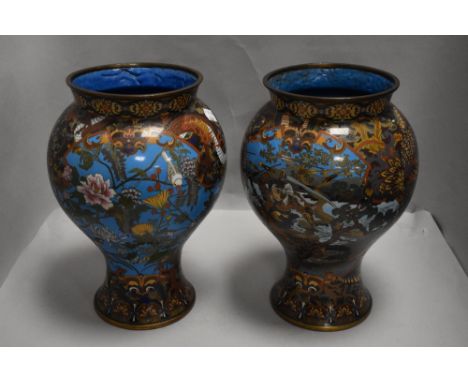 Two 20th century fine Japanese cloisonné baluster vases having samurai scenes with dragons and mountainous landscapes.
Condit