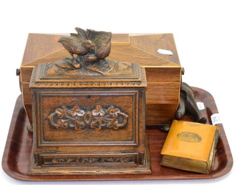 Small group of treen including 19th century Black Forest style correspondence box and nut cracker, Regency rosewood tea caddy