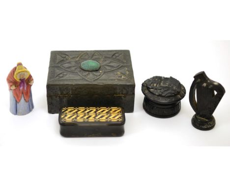 A Worcester candle snuffer (a.f.), inlaid snuff box, two bog oak pieces depicting a harp and castle, a small box and cover an