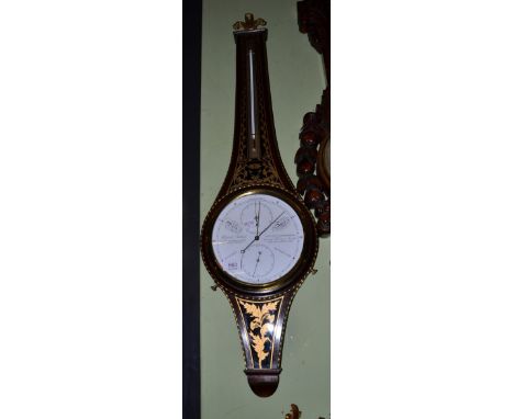 Gilt metal mounted wheel barometer by Comitti & Son 