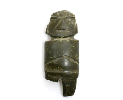 A Mezcala carved green stone axe God figure, circa 300BCE- 200 AD, with stylised features and having mineral deposits, (a/f) 