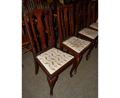 A ladder back armchair, together with a set of four Queen Anne style dining chairs 