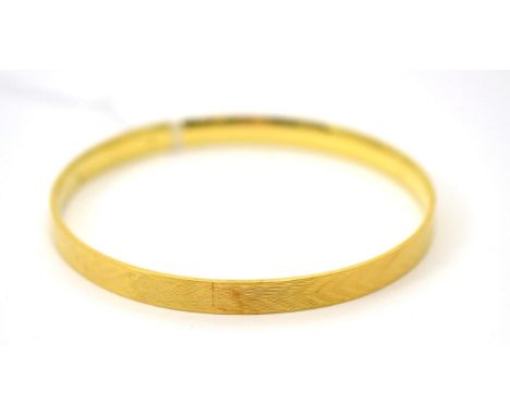 A bangle stamped '15ct'17.3g