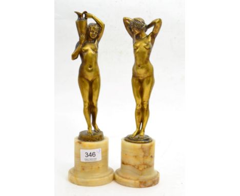 A pair of Art Deco bronze figures on marble bases, signed Joe Descomps 