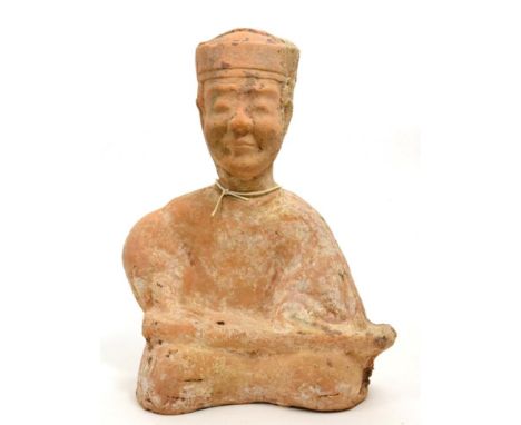 A Chinese pottery seated musician, Han Dynasty, circa 200BCE-200AD, modelled in the round playing a guqin on his lap, 33cm hi