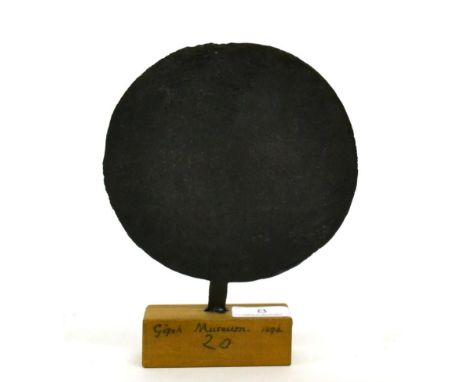 An ancient Egyptian middle kingdom bronze mirror, circa 1500-2000 BC, modelled as a standard, on wooden plinth, ex Gizeh muse