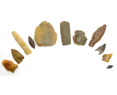A collection of ancient Egyptian pre dynastic lithics, Faiyum, Egypt, circa 3000-4000 BC, to include a harpoon point, knife b