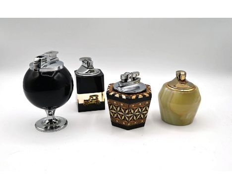 Four vintage table lighters&nbsp;