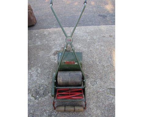 A Webb grass cutter with roller