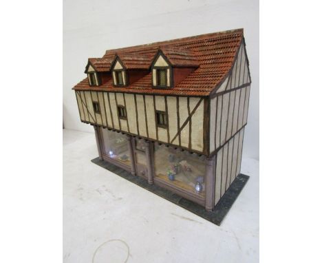 A scratch built French-Normandy florists, entirely hand made down to actual plaster on the exterior walls- made for Dreamwork