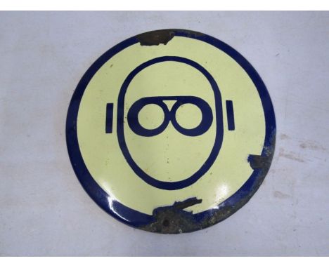 An enamel safety glasses plaque 26cm dia