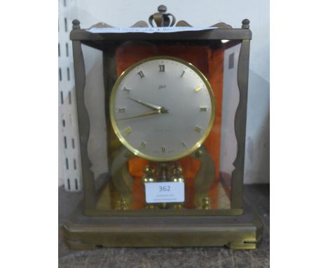 A Schatz 1000 day torsion clock with four ball pendulum 