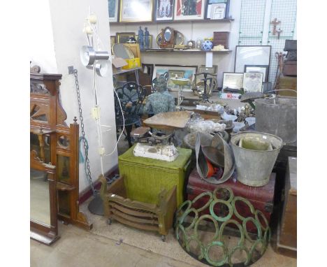 A Victorian cast iron fire grate, a cast iron horse shoe shaped hay rack, scales, tin trunk, standard lamp, etc. 