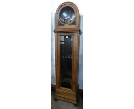 An early 20th Century oak triple weight longcase clock, a/f 