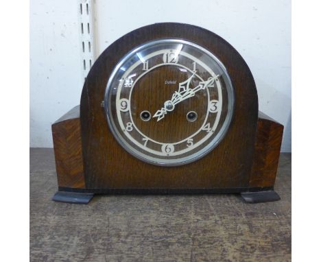 An Art Deco Enfield oak mantel clock 