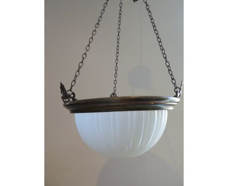 A gilt metal and opaque glass hanging light of circular dished form, approx 30cm diameter, small dents to gilt metal rim 