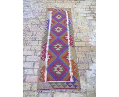 A new hand knotted woollen Maimana Kilim runner, 1.94m x 0.63m 