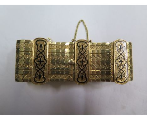 A French 18ct yellow gold and enamel bracelet, approx 19cm x 3.2cm long, approx 56.6 grams in good condition with minor wear 
