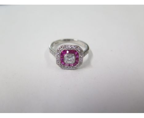 A platinum Art Deco style ruby and diamond ring, hallmarked, size N, head approx 11mm x 11mm, approx 5.7 grams in good condit