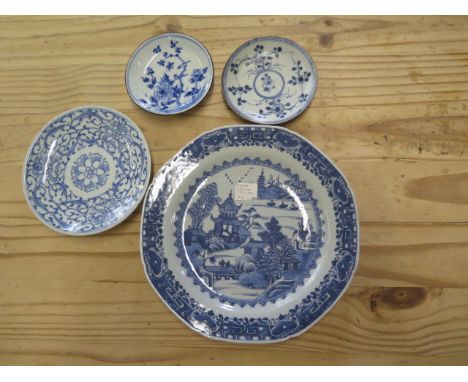 A Chinese blue and white porcelain plate, 23cm diameter, chips to rim otherwise good, two saucers and a dished plate, 15cm di