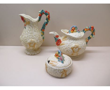 Three pieces of Clarice Cliff celtic harvest ware, all generally good condition 