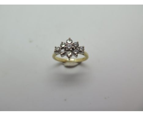 A good quality 18ct yellow gold 9 stone diamond ring, hallmarked, size K, diamonds approx 0.08ct each, approx 3.6 grams, diam