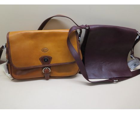 A Cuoieria Fiorentia two tone leather satchel type handbag, 30cm wide, and one further Cuoieria Fiorentia leather handbag, 23