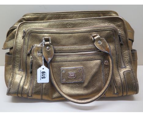 An Anya Hindmarch patent tote gilt leather handbag with suede lining, 40cm wide, signs of light use 