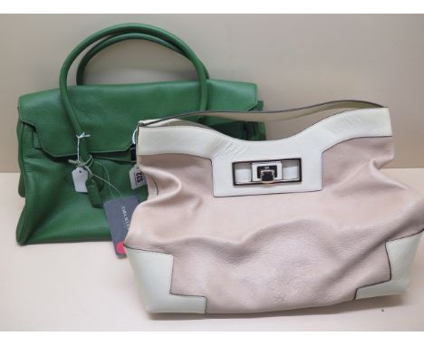A Anya Hindmarch two tone cream leather handbag, 40cm wide, and a green leather handbag from Zara Accessories, 40cm wide, bot