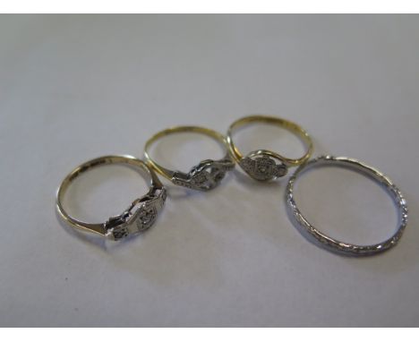 Four rings comprising 18ct and platinum (2) and a platinum and a 10ct white gold ring, sizes L, K, K and T, overall weight ap