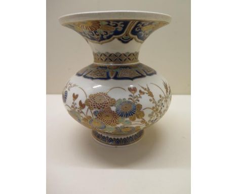 A well-potted 19th century Japanese Satsuma vase finely decorated with a floral design in coloured enamel and gold, signed to