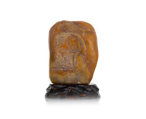 CHINESE HARDSTONE SEAL, 20TH CENTURY carved with a figural scene, bearing character mark, on raised standseal 10cm high