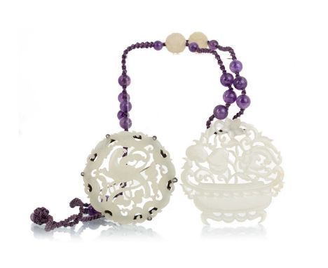TWO CHINESE JADE AMULETS, EARLY 20TH CENTURY one carved as a planter with flowers, the other carved with a bird amongst scrol