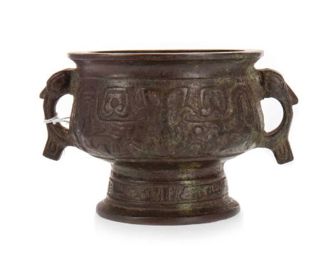 ARCHAISTIC BRONZE RITUAL FOOD VESSEL, 19TH CENTURY the body flanked by a pair of stylised dragon-head loop handles and cast w