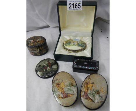 A mixed lot including papier mache' and mother of pearl snuff box.