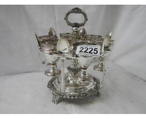 A Victorian Sheffield plate egg cup stand complete with spoons.