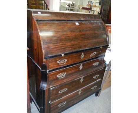 A Victorian dome top bureau. ****Condition report**** Height 125.5cm, width at widest 105cm, depth at widest 55cm. 2 drawer h