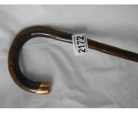 A walking stick with 9ct gold mount. ****Condition report**** Total L 105cm. No ferrule under rubber tip