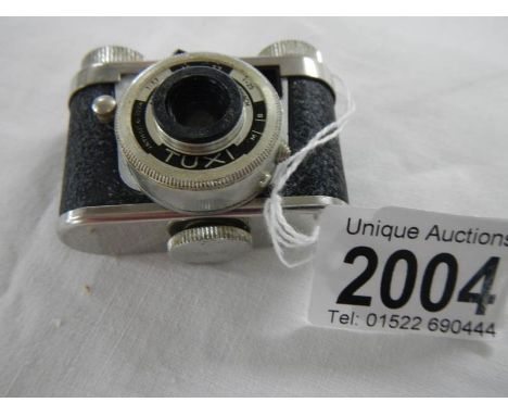 A miniature spy camera.