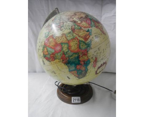 An illuminating world globe, 15" tall.