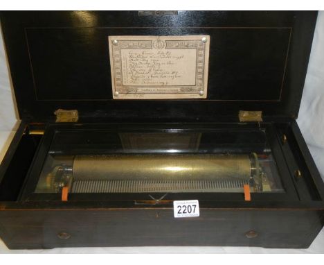 A Victorian 10 tune music box in first class condition.