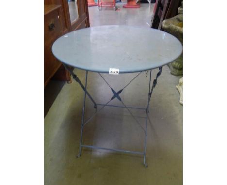 An old metal circular garden table.